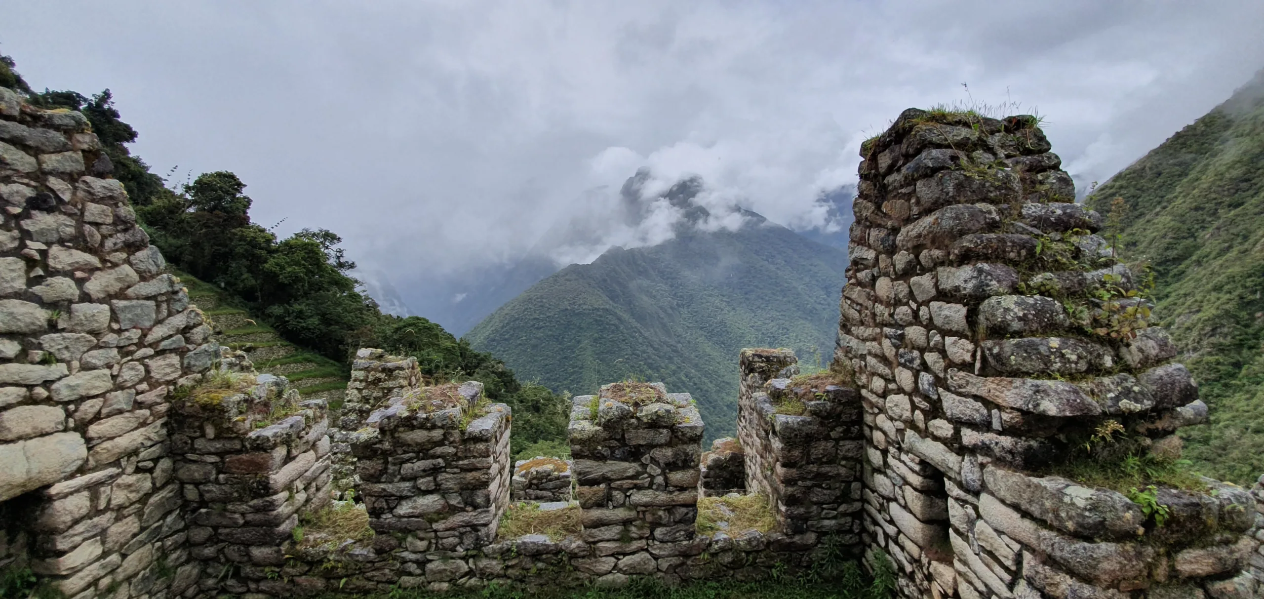 Photo taken from Wiñay Wayna, includes an old building and someview